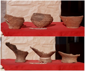 Seis vasijas
cerámicas de la ocupación superior de E11.